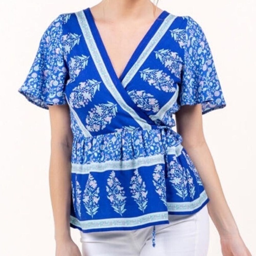 FRANCESCA’S blue rain wrap top size XXS